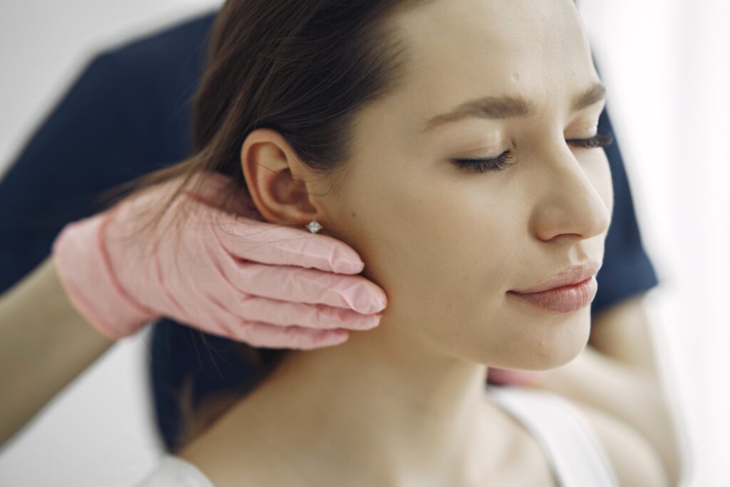 Service-3-min Professional facial massage promotes relaxation and healthy skin at a spa clinic.